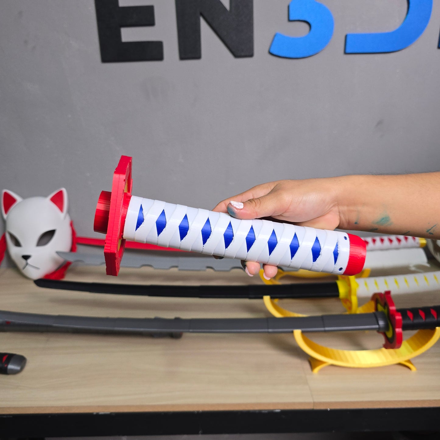 Katana de plastico retráctil de Giyu Tomioka Demon Slayer